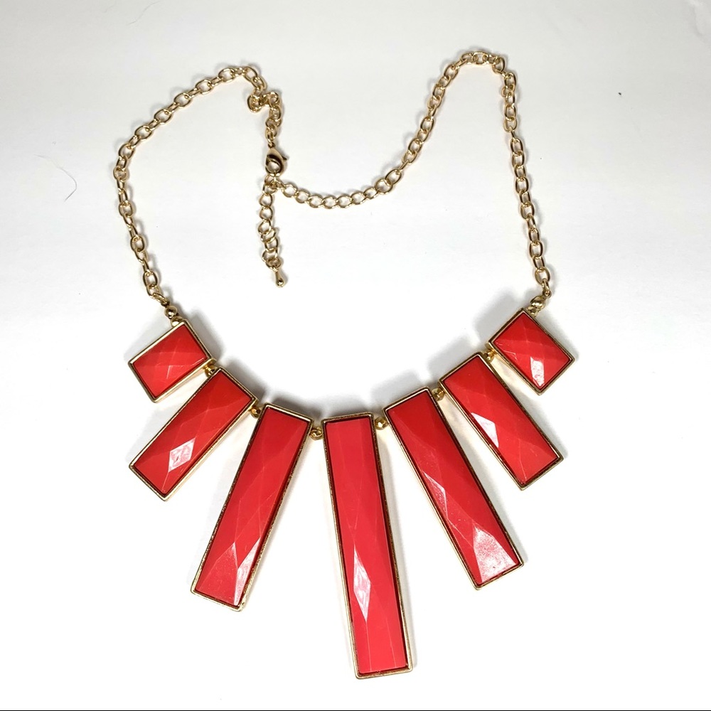 Gold tone and coral colored statement necklace